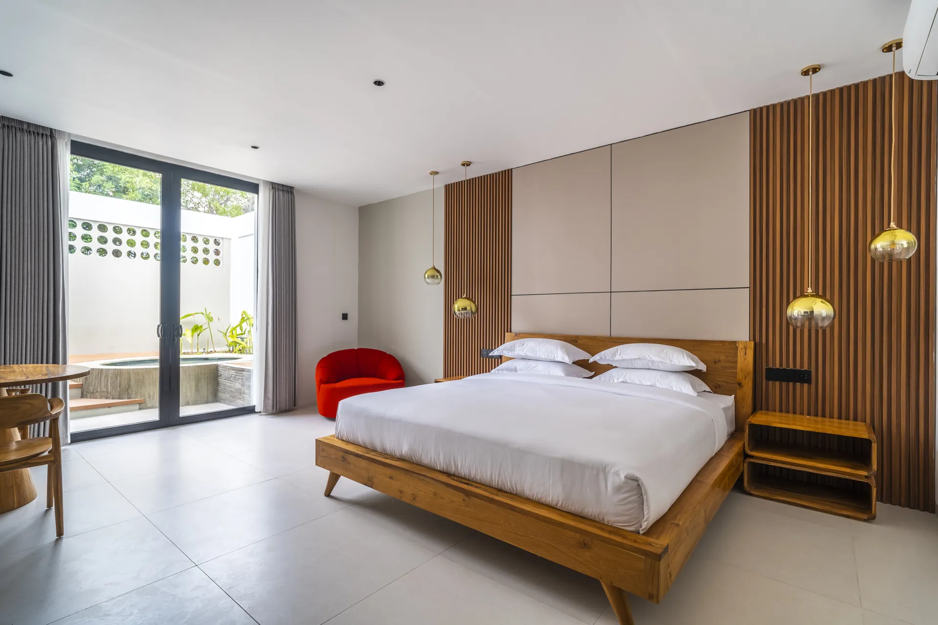 King bedroom of the One-Bedroom Villa opening to its private terrace